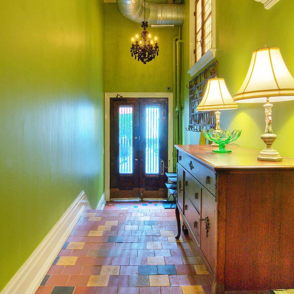 New York apartment entryway painted bright green